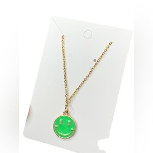 Gold and green smiley face